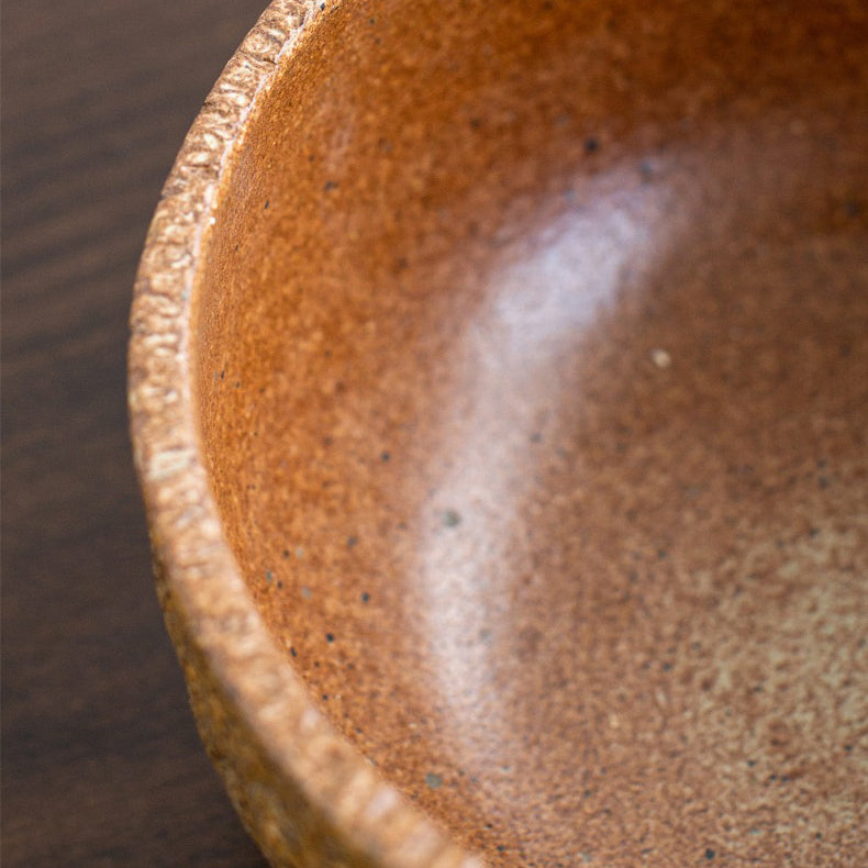 Close-up of the Artisan Coarse Pottery Lotus Tea Washer filled with boiling water
