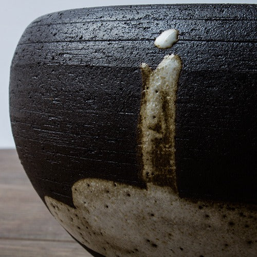 Zen Monk Ceramic Tea Washer showcasing its elegant design and functionality.