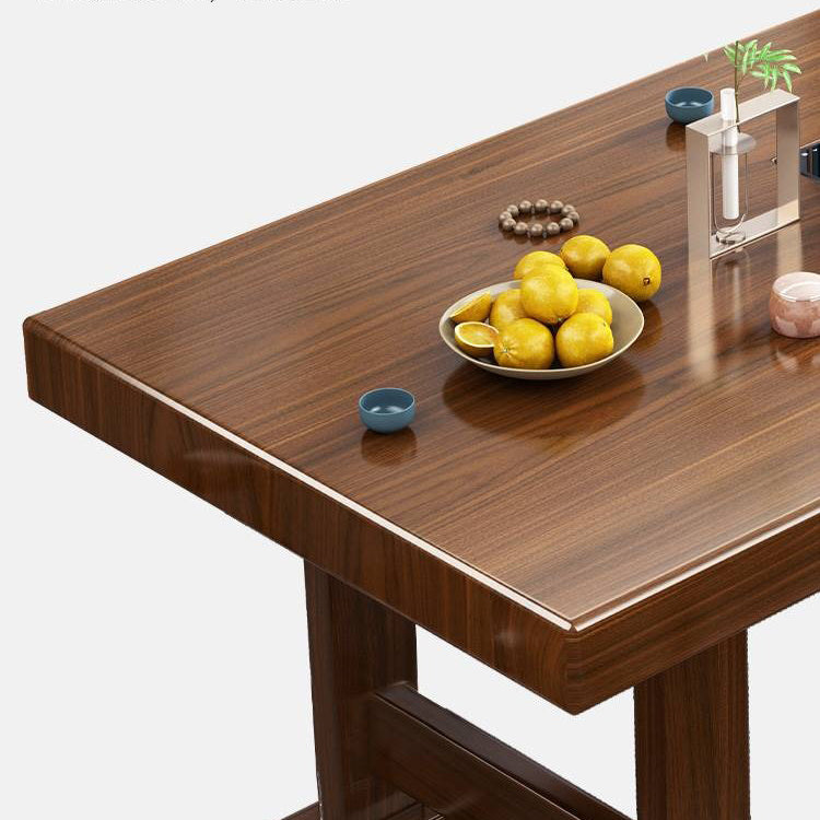 Elegant Chinese tea ceremony setup on a luxury wood tea table with chairs and automatic stove
