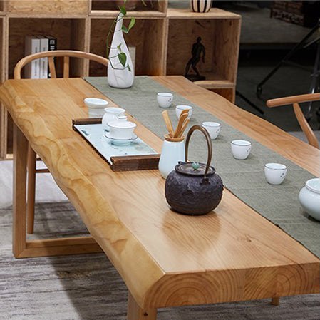 Living room setup featuring the modern tea table with chairs