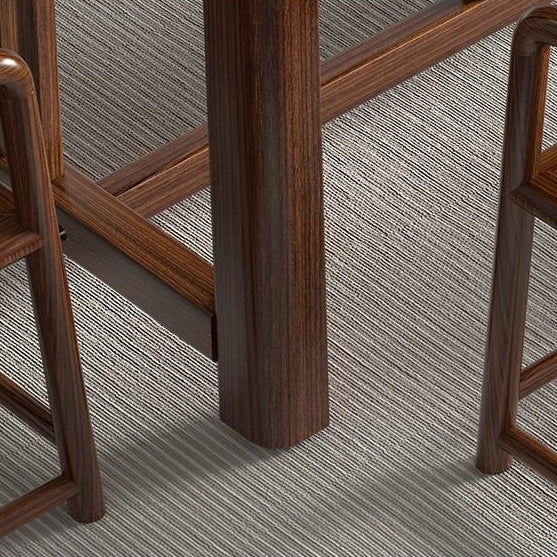 Close-up of the durable elm wood surface of the Zen tea table, highlighting the natural grain