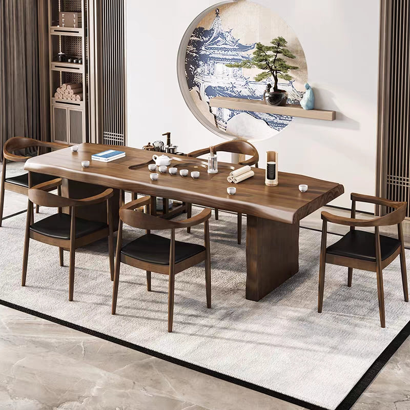Front view of handcrafted Chinese tea furniture set with solid wood table and leather chairs