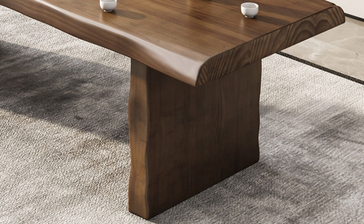 Close-up of eco-friendly Gongfu tea table surface showing polished pine wood grain