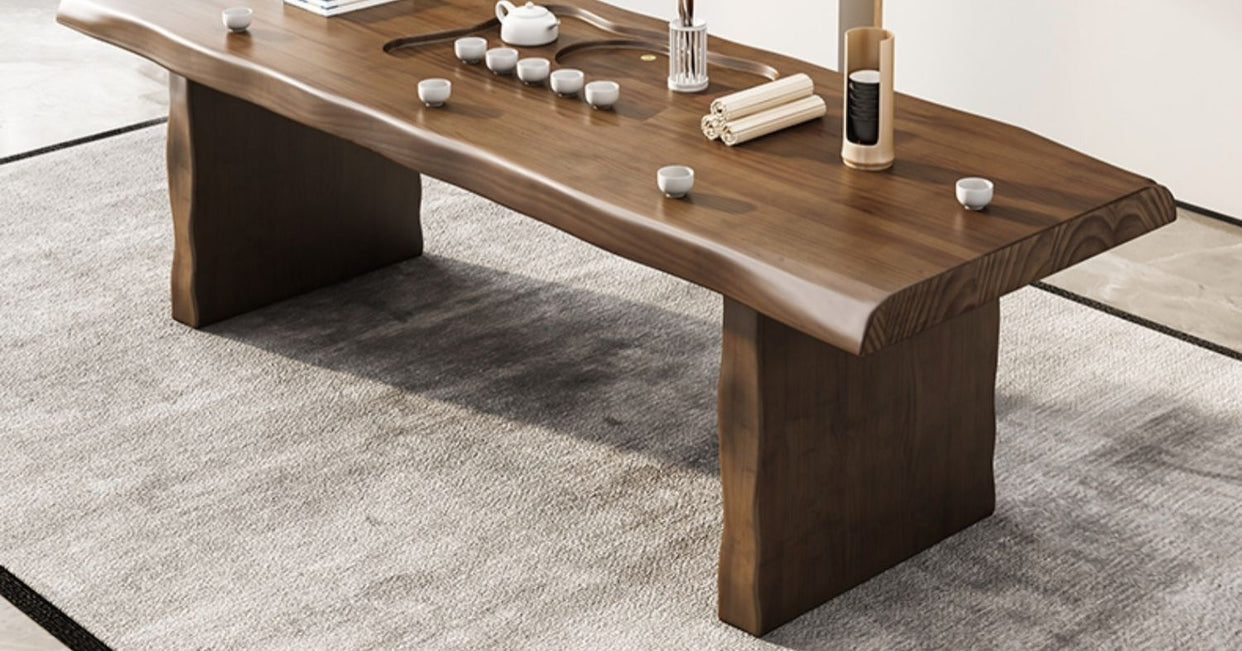 Luxury tea ceremony table setup with heater cabinet and five guest chairs in a serene tea room