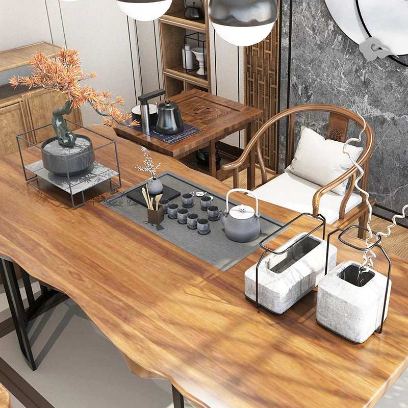Close-up of the ergonomic chair design, showcasing the rustic wooden tea table set.