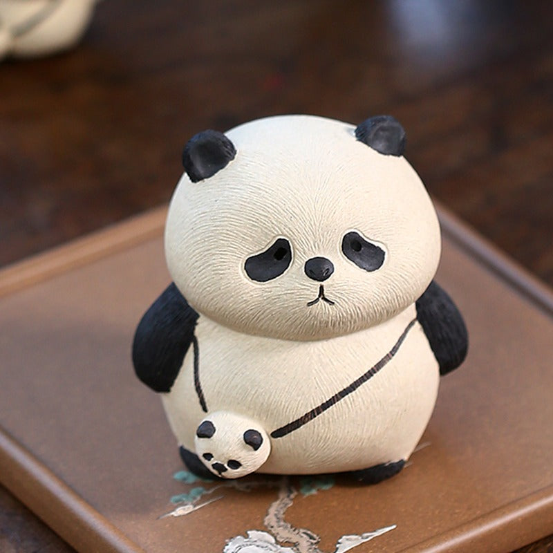 Close-up of the textured back hair of the clay panda tea pet, highlighting craftsmanship