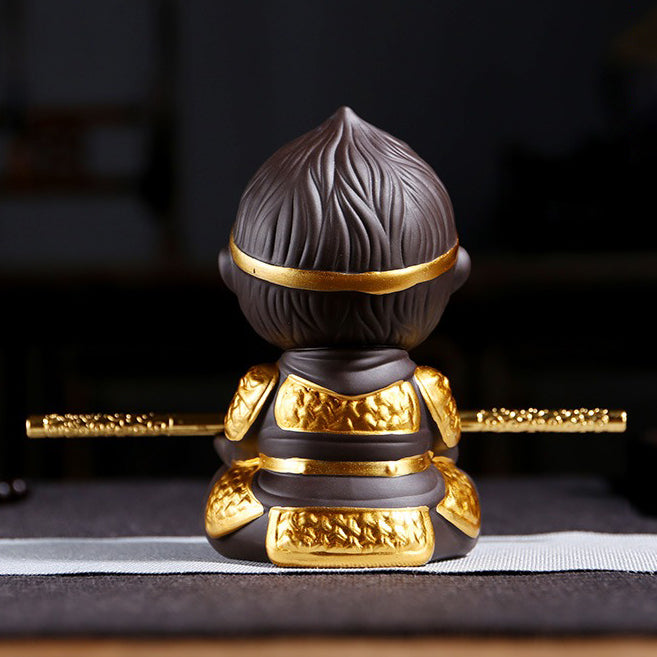 Wukong tea pet used as a decorative piece in a traditional tea ceremony setting