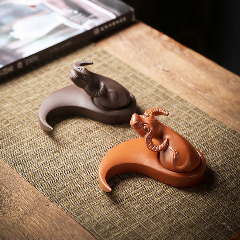 Yixing clay Buffalo Eight Diagrams Tea Pet with polished surface and stable base