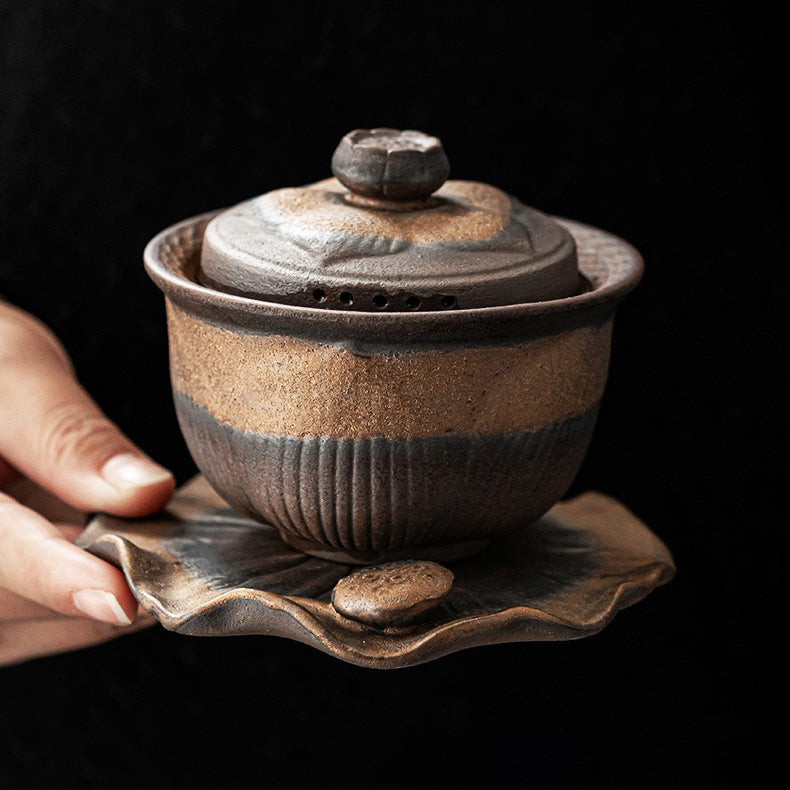Top view of the handmade Chinese gaiwan teapot showing lotus lid and rustic glaze