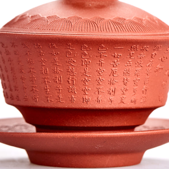 Side view of the gaiwan with saucer, perfect for tea brewing.