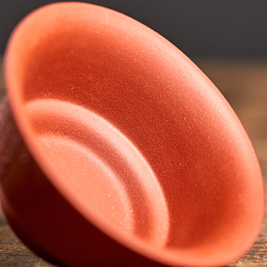 Close-up of the Heart Sutra Yixing clay gaiwan highlighting its engraved design.