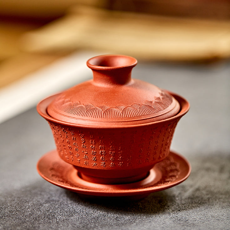 Side view of the gaiwan with saucer, perfect for tea brewing.