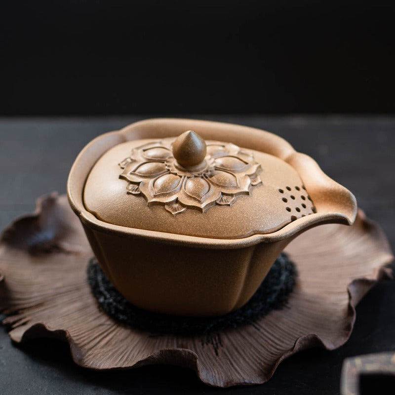 Handcrafted Yixing Yellow Clay Lotus Gaiwan Teapot, showcasing the unique eagle beak spout.