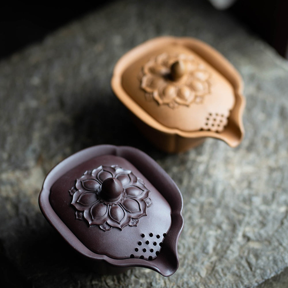 Close-up of the Yixing Yellow Clay Gaiwan Teapot highlighting its smooth lines and craftsmanship.