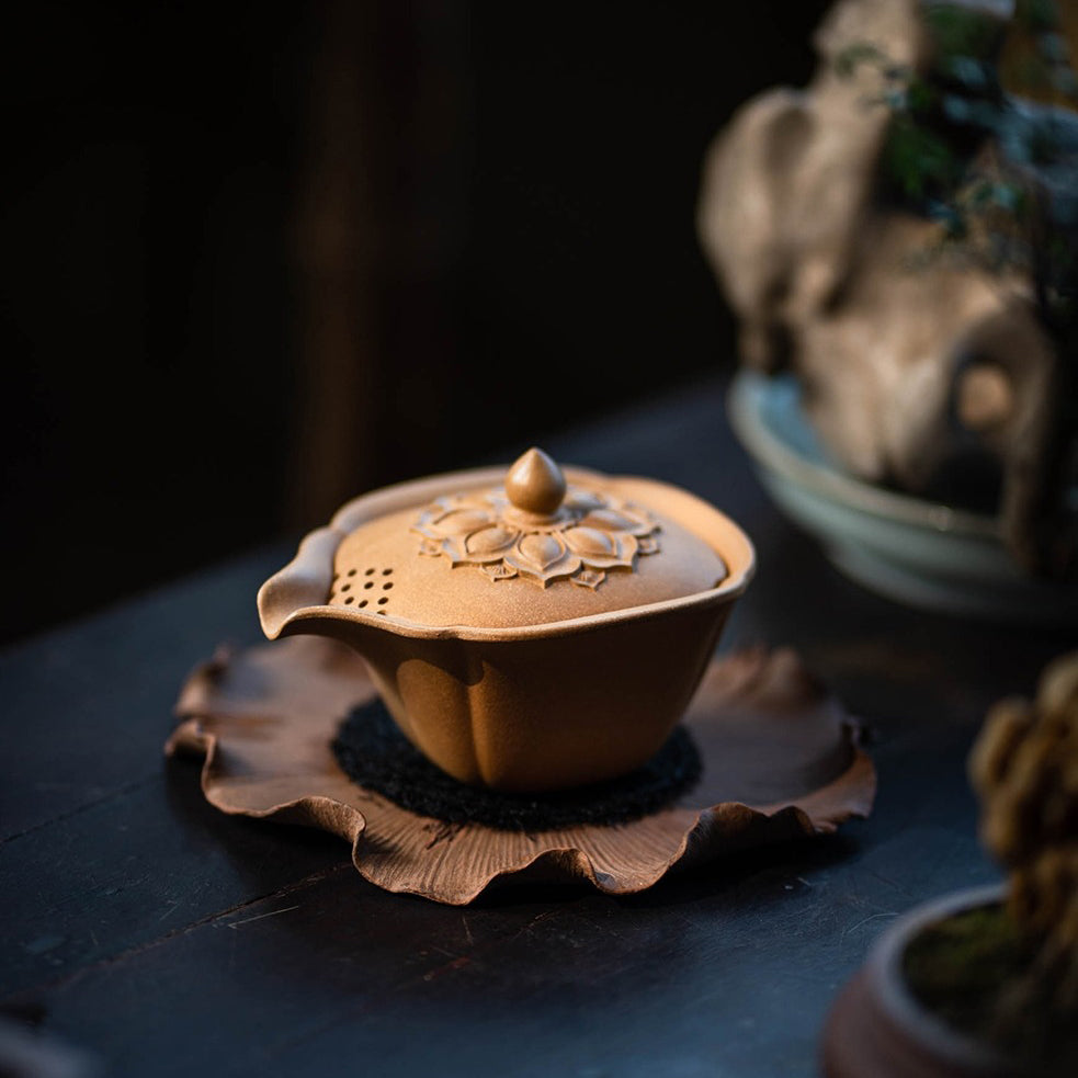 Handcrafted Yixing Yellow Clay Lotus Gaiwan Teapot, showcasing the unique eagle beak spout.