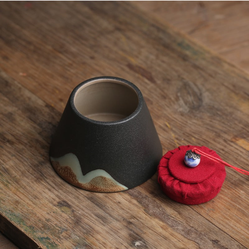 Top view of the Japanese ceramic tea caddy with its wide mouth, perfect for easy tea access.