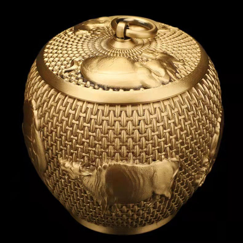 Unique five cattle design on the brass tea caddy, ideal for tea enthusiasts.