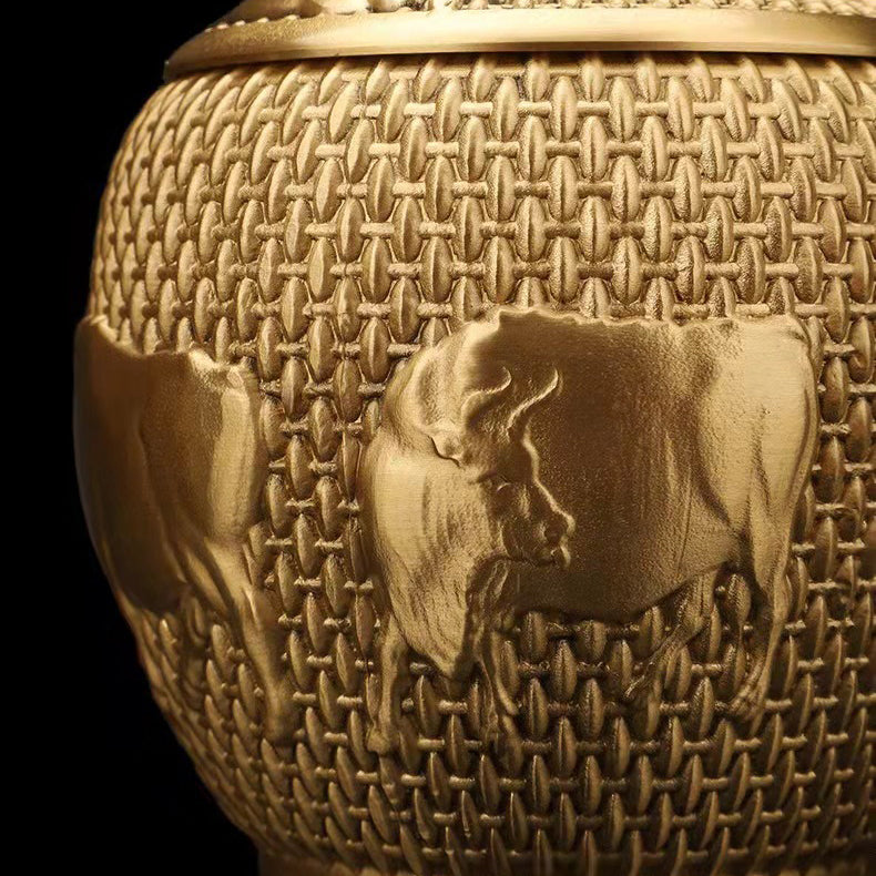 Elegant Five Cattle Brass Tea Caddy showcasing intricate design and polished finish.