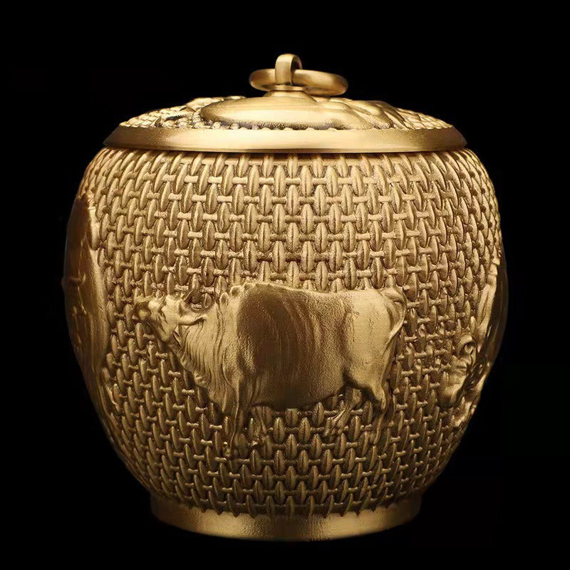 Elegant Five Cattle Brass Tea Caddy showcasing intricate design and polished finish.