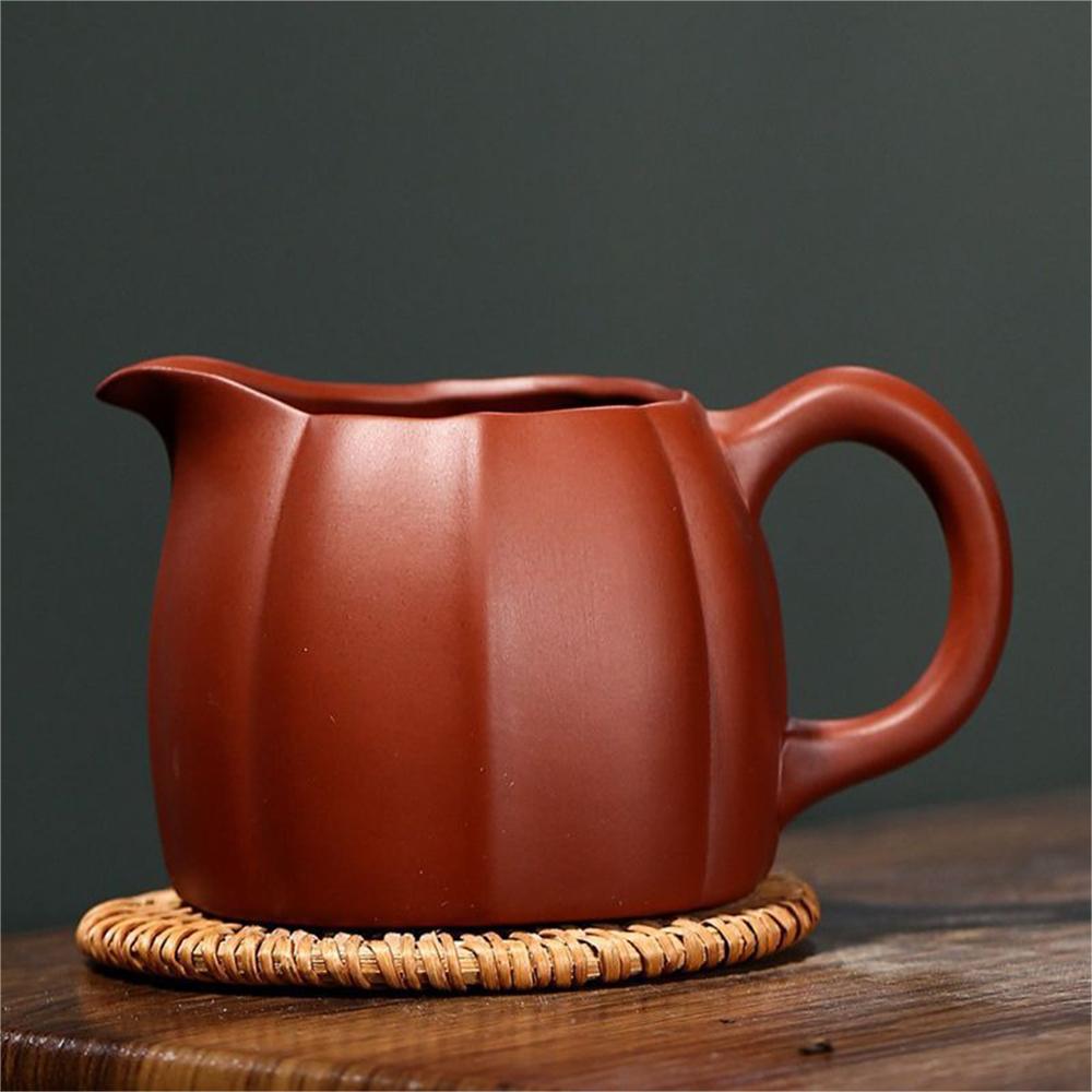 Front view of the large Yixing teacup showcasing its elegant design and texture.