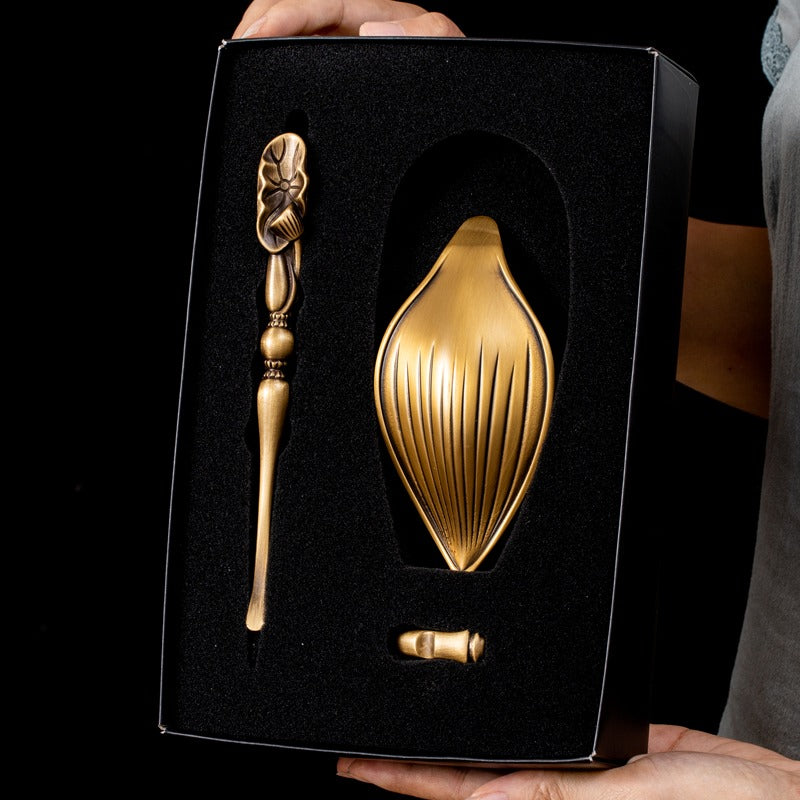 Close-up of the brass tea holder highlighting its craftsmanship and design.
