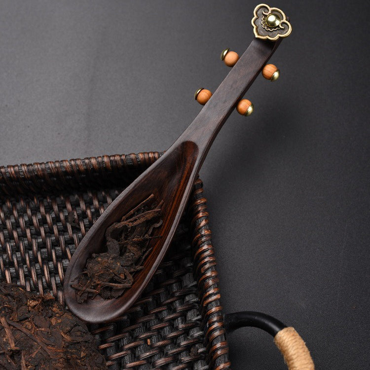 Elegant handcrafted ebony tea utensil for tea ceremonies