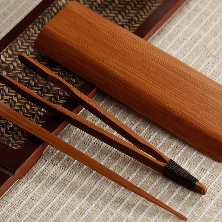 Bamboo tea holder with a bag, perfect for serving and displaying tea leaves