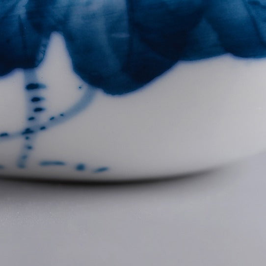 Porcelain cha he used in tea appreciation with dry tea inside