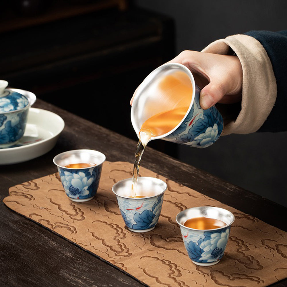 Full view of the Elegant Silver-Plated Lotus Porcelain Tea Set in its gift box, emphasizing its perfect presentation for gifting.
