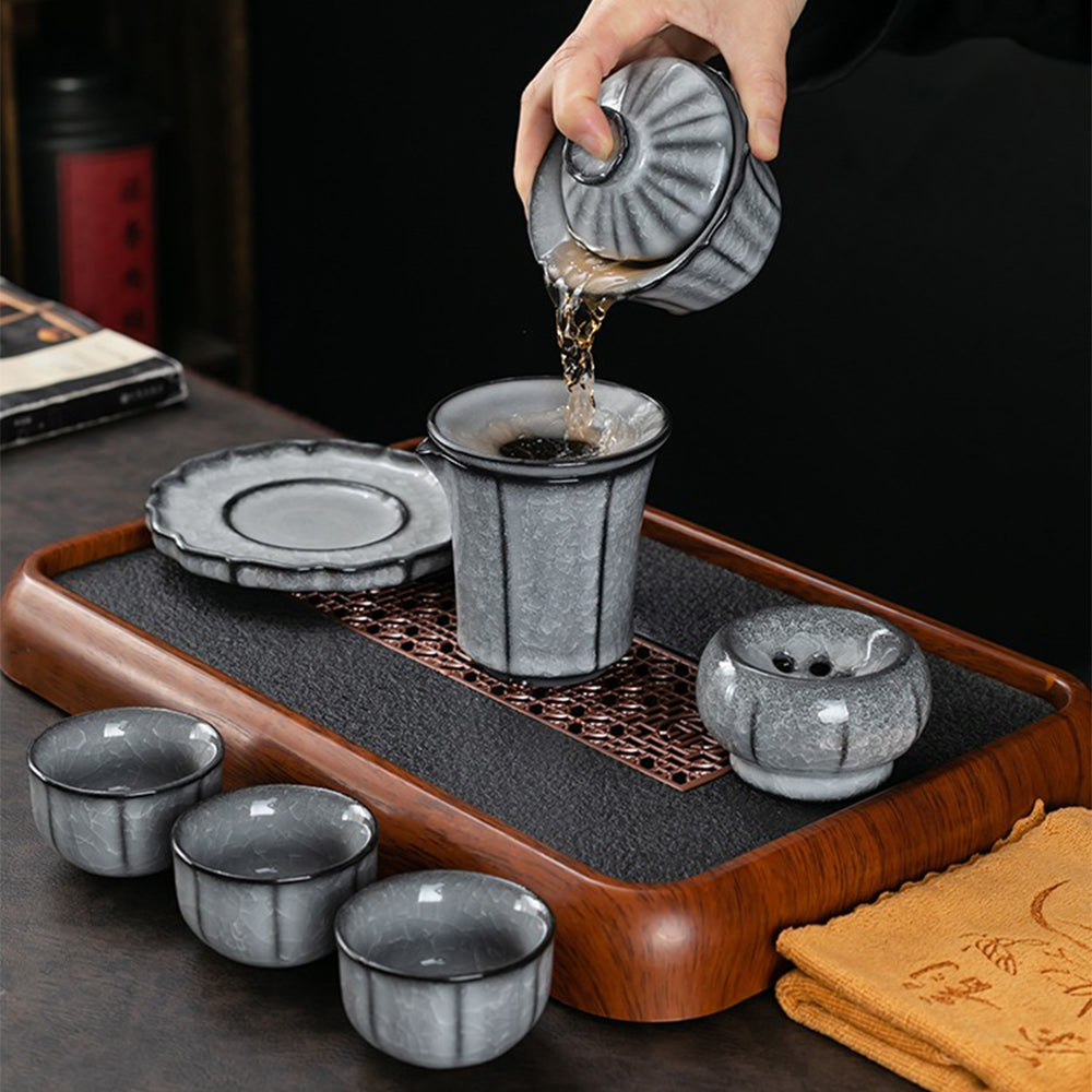 Detailed view of the black ice crack tea cup, showcasing its unique design.