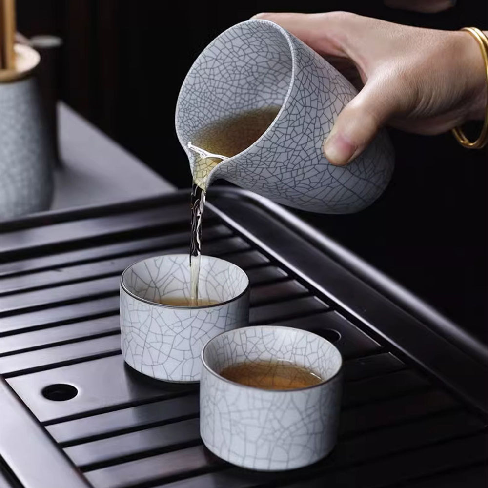All components of the milky white Ruyao tea set arranged in a beautiful gift box.