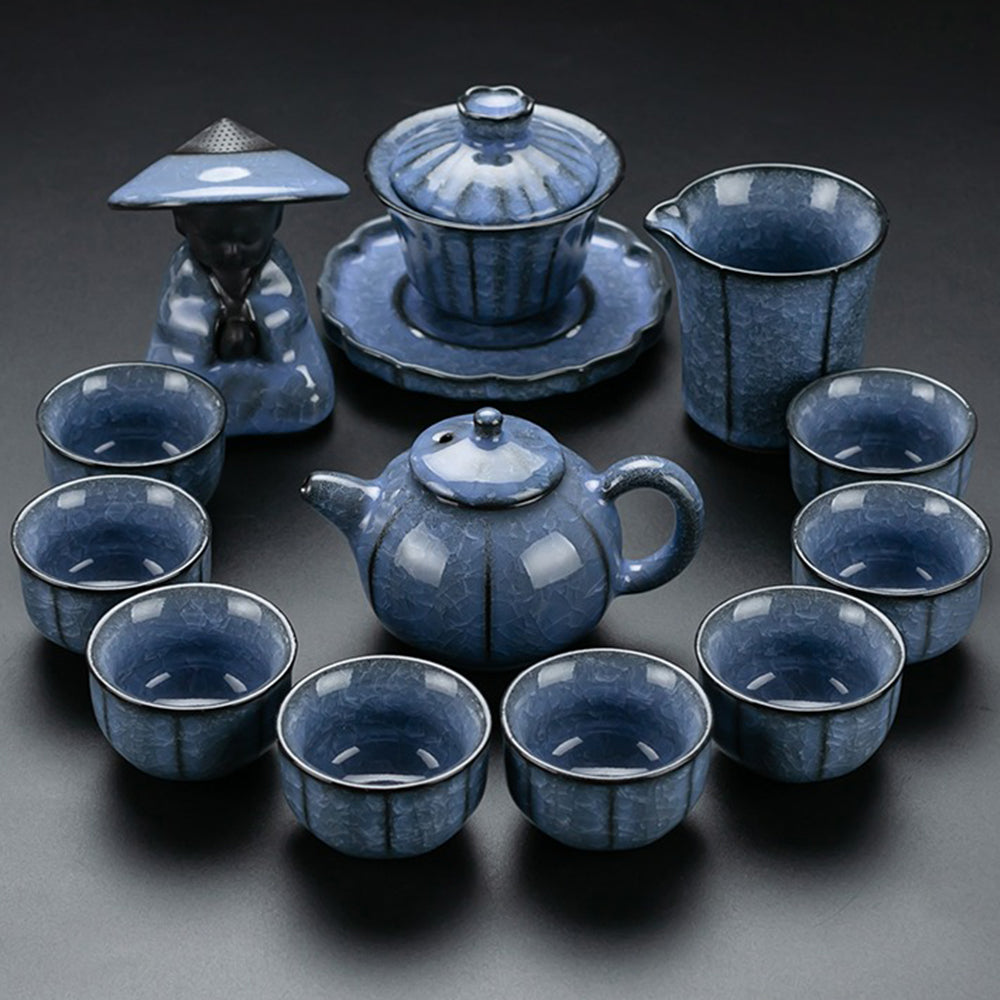 Blue ice crack kung fu tea set displayed elegantly with tea cups and teapot.