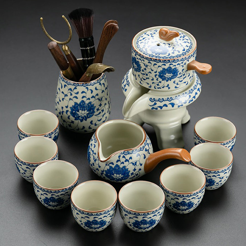 Top view of the blue and white porcelain tea set arranged for serving, showcasing lotus patterns and crackle glaze.