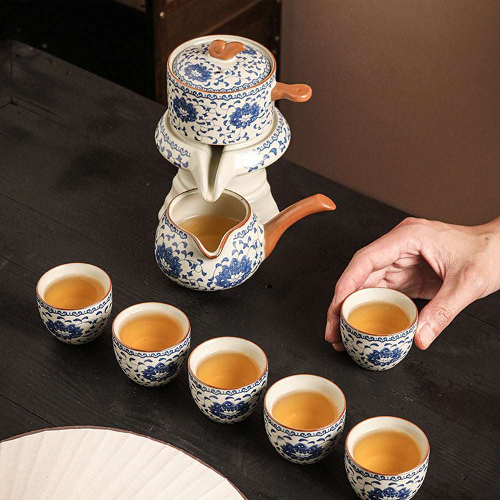 Close-up of the automatic rotary teapot in action, highlighting the anti-slip handle and smooth water flow.