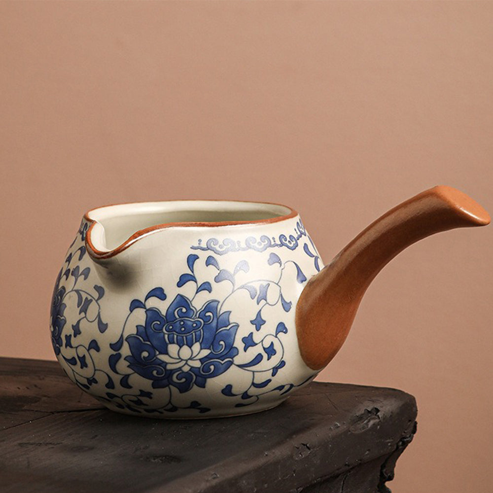 Close-up of the automatic rotary teapot in action, highlighting the anti-slip handle and smooth water flow.