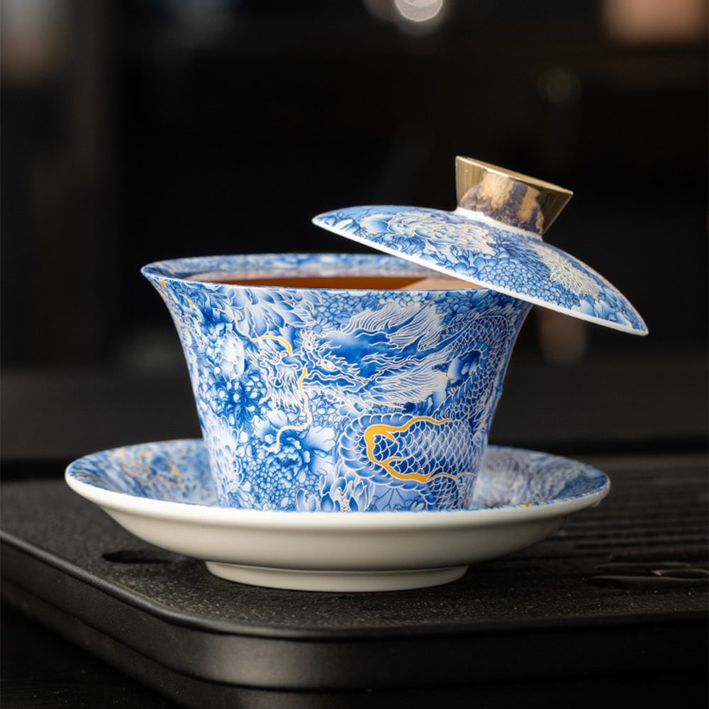 Tea brewing with high quality gaiwan for tea lovers, showcasing the lid hovering over the rim