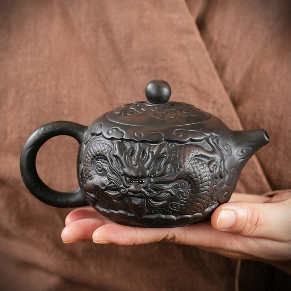 Overhead view of the full kung fu tea set arranged for serving—eight cups, teapot, strainer, and utensils set on a textured linen cloth.