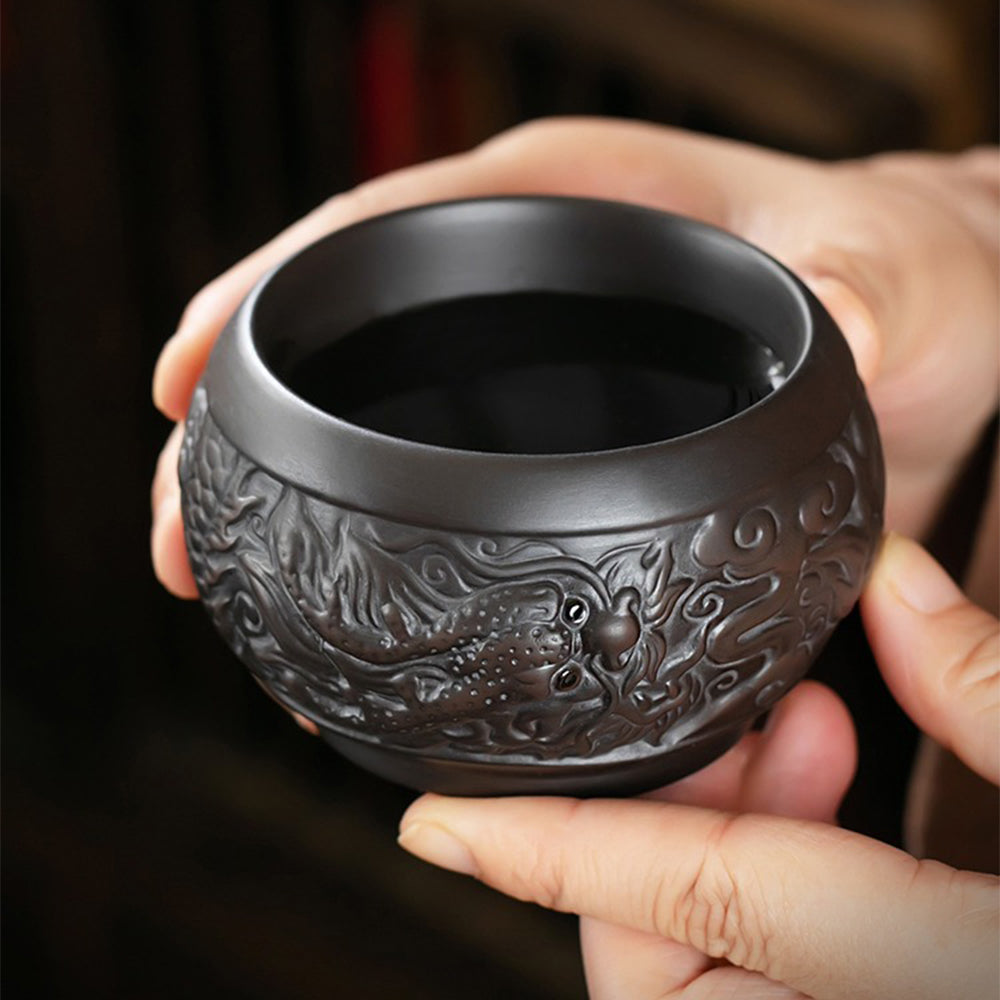 Gift box presentation of the traditional Chinese tea set for sale, with protective padding and branded packaging featuring gold accents.
