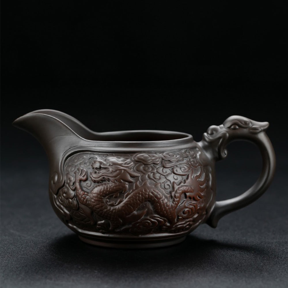 Complete view of the purple pottery tea set, emphasizing its elegant design and rich color.