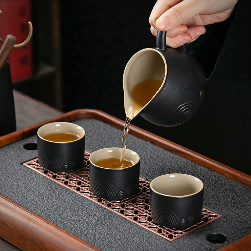 Complete Japanese tea set with gaiwan, cups, and accessories