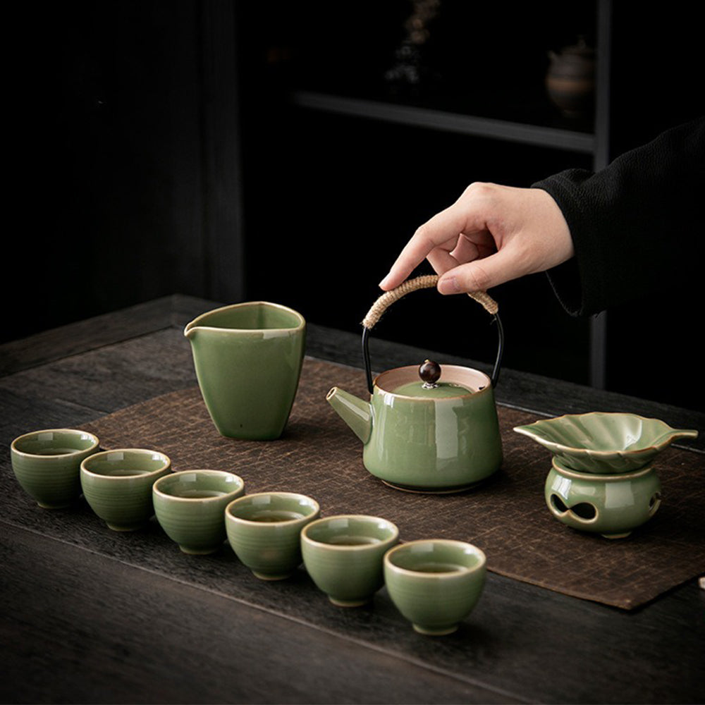 Close-up of the celadon teapot showcasing its vibrant glaze and intricate design.