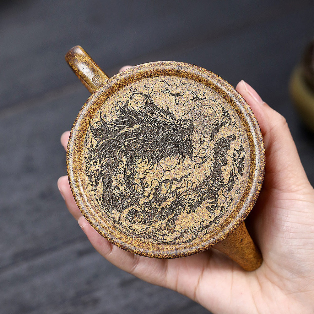 Front view of vintage-style Yixing Duan Ni teapot with traditional Chinese design