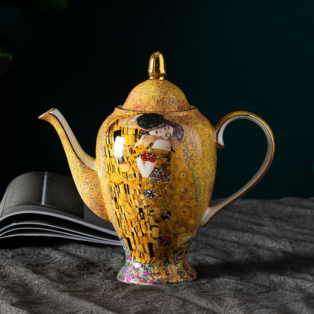Set of six cups and saucers with gilded handles, perfect for hosting a refined tea gathering.