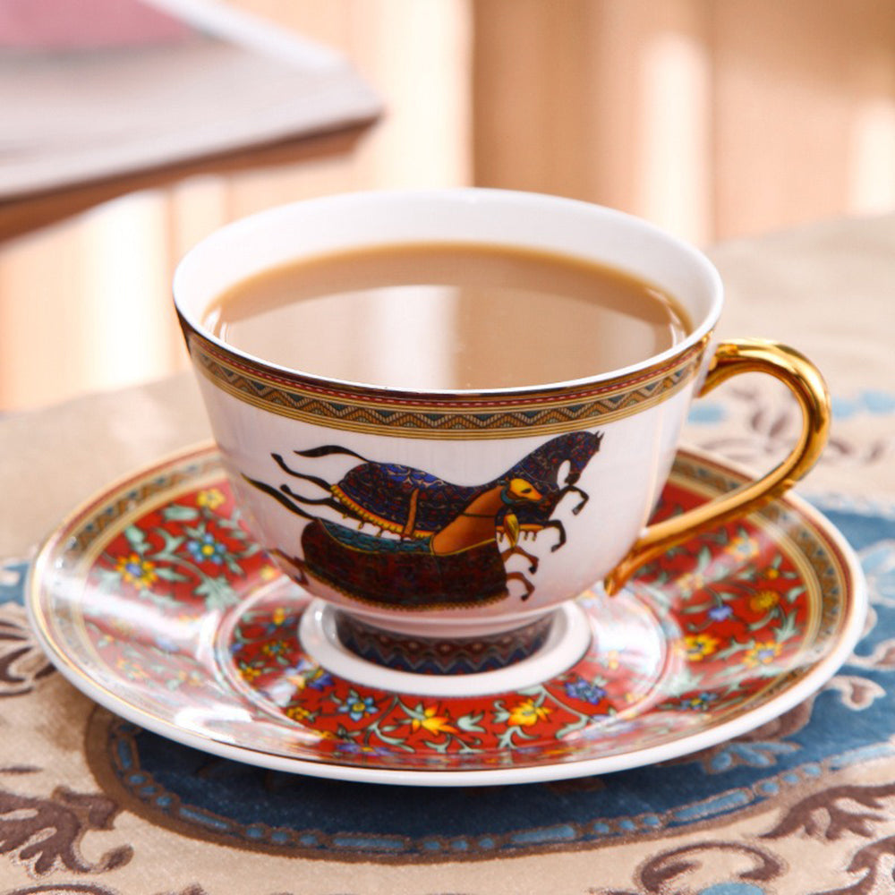 Elegant horse tea set showcasing gold accents and vibrant colors.
