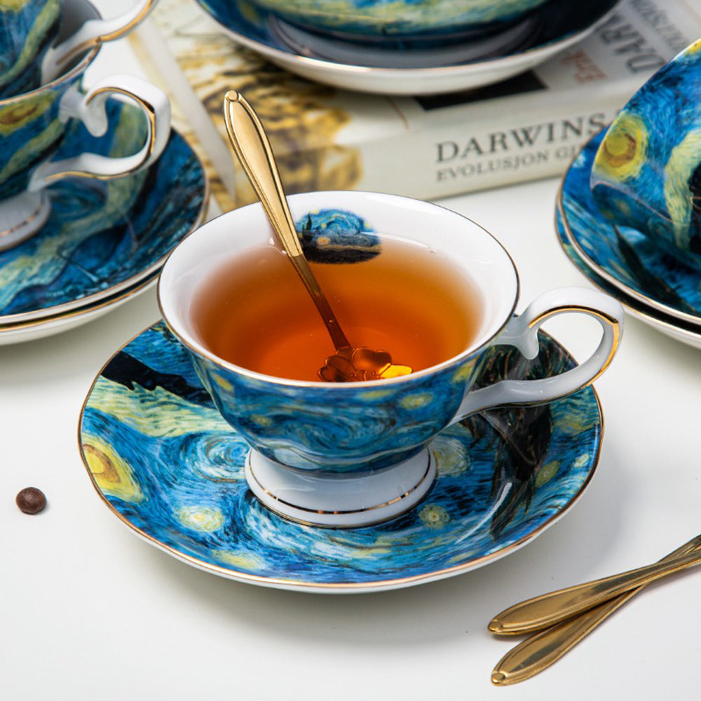Elegant bone china tea set with cups, saucers, and display shelf inspired by Van Goghs The Starry Night