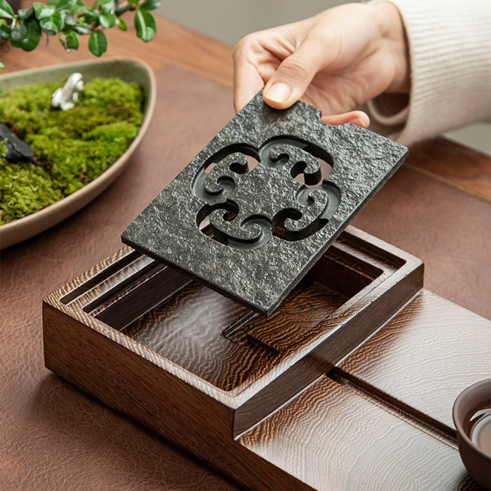 Top-down image of the premium tea ceremony tray with drainage system highlighting the removable black stone panel.