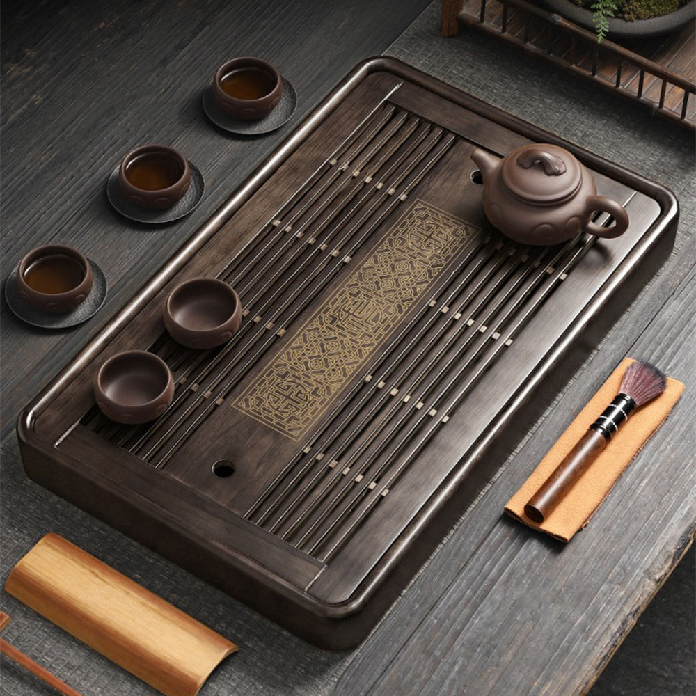 Elegant Lithocarpus wood Gongfu tea tray showcasing its drainage feature.