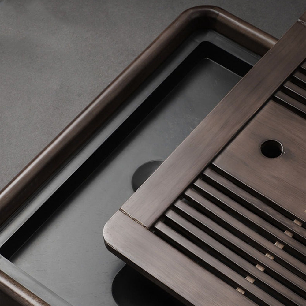 Elegant Lithocarpus wood Gongfu tea tray showcasing its drainage feature.