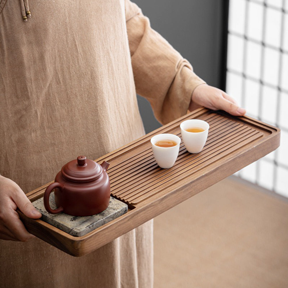 Tea tray with drainage system and teapot placement for tea ceremony