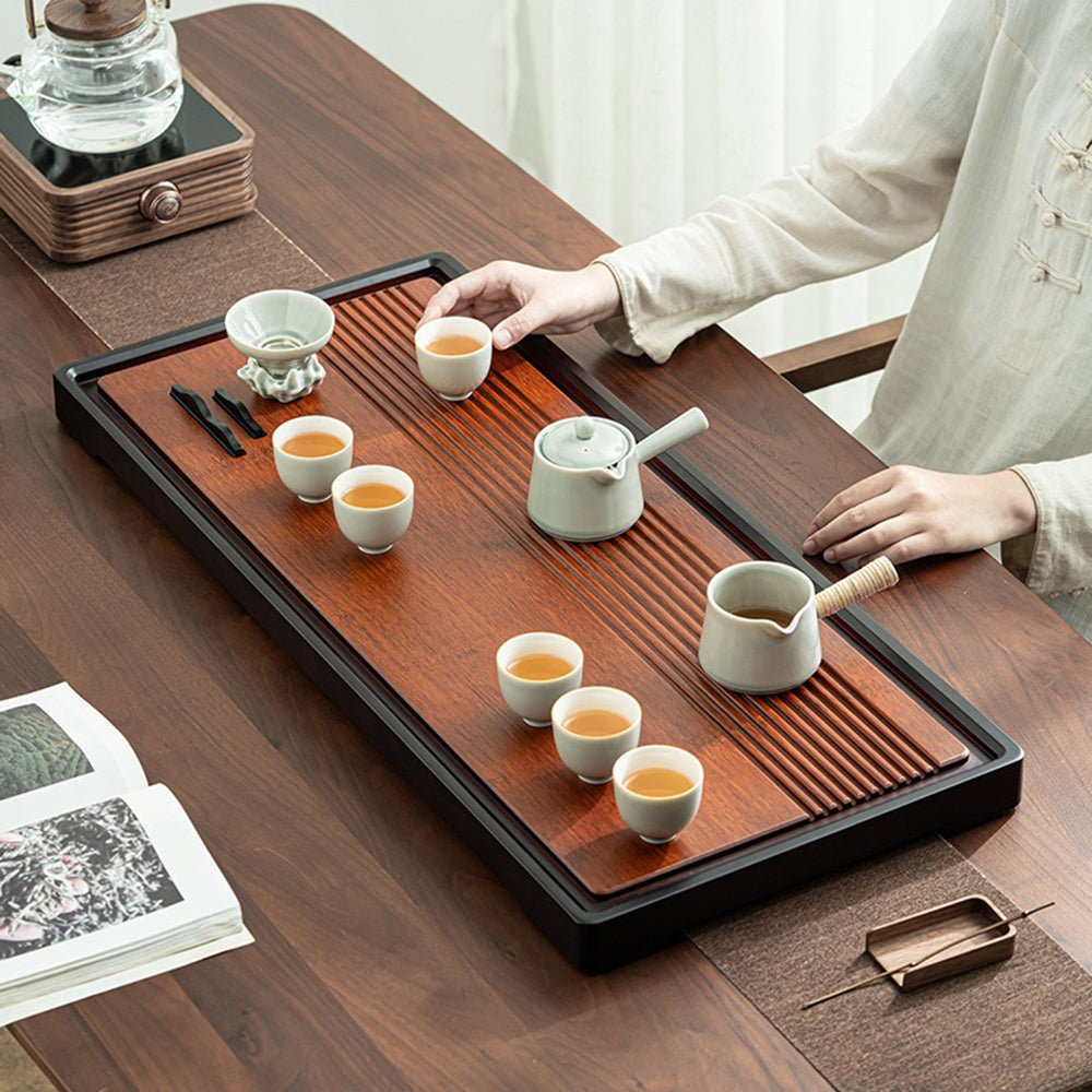 Close-up of the heavy bamboo Chinese tea tray showing water drainage grooves